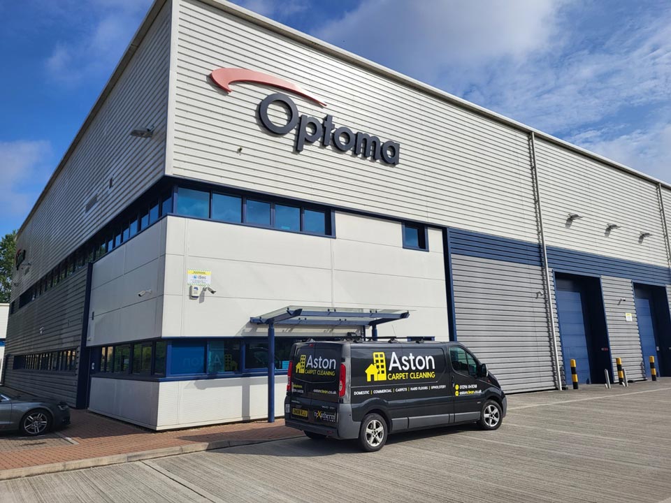 Aston Commercial Cleaning van outside warehouse providing industrial and commercial cleaning services in Milton Keynes